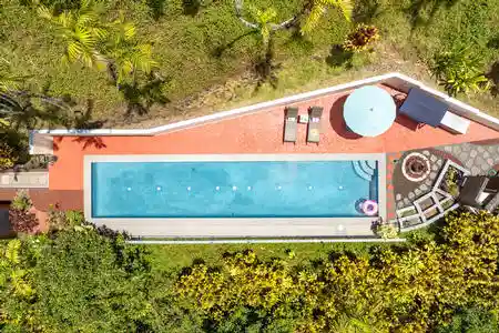 daytime drone shot directly above the 50 foot salt water pool