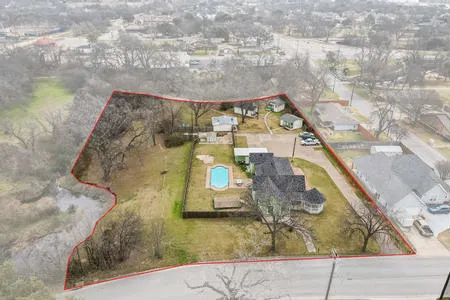 Travis Street Cottages inn for sale