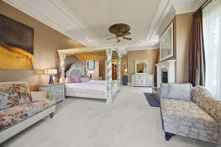 Primary Suite with bathroom and 2 walk-in closets