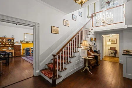 the front staircase from the Foyer