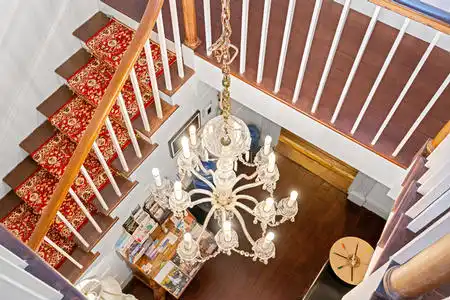 the basic furnishings, including all chandeliers will convey at the listed price